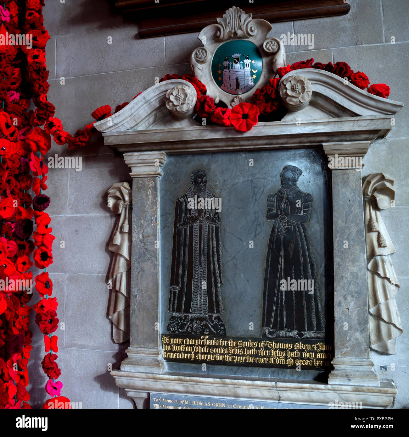 Thomas Oken memorial in St Mary`s Church, decorated as part of Warwick Poppies 2018 Stock Photo